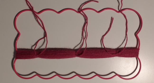 Tie wool to create pom poms